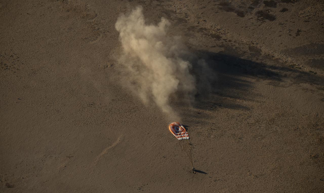 The Soyuz MS-08 spacecraft is seen as it lands with Expedition 56 Commander Drew Feustel and Flight Engineer Ricky Arnold of NASA, along with Flight Engineer and Soyuz Commander Oleg Artemyev of Roscosmos near the town of Zhezkazgan, Kazakhstan on Thursday, Oct. 4, 2018. Feustel, Arnold, and Artemyev are returning after 197 days in space where they served as members of the Expedition 55 and 56 crews onboard the International Space Station. Photo Credit: (NASA/Bill Ingalls)