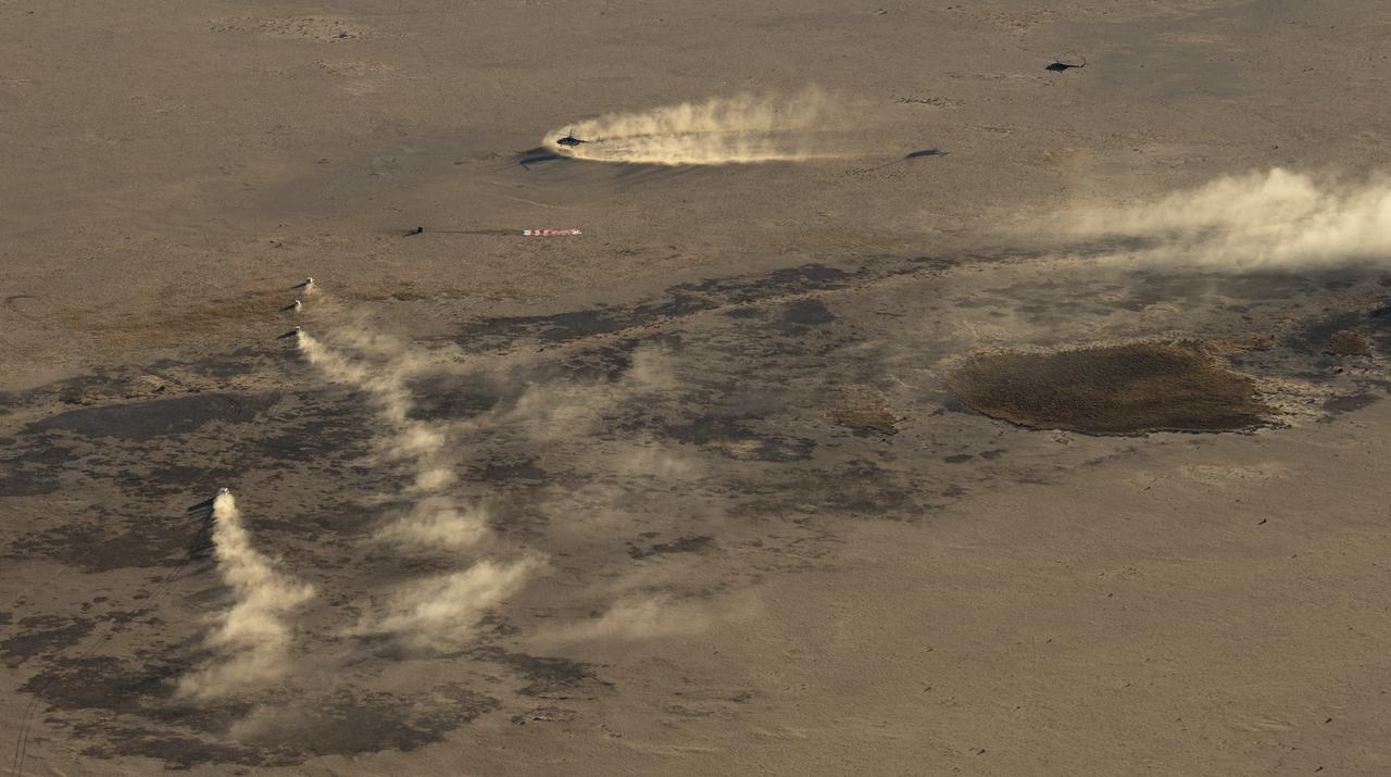 Russian Search and Rescue teams arrive at the Soyuz MS-08 spacecraft shortly after it landed with Expedition 56 Commander Drew Feustel and Flight Engineer Ricky Arnold of NASA, along with Flight Engineer and Soyuz Commander Oleg Artemyev of Roscosmos near the town of Zhezkazgan, Kazakhstan on Thursday, Oct. 4, 2018. Feustel, Arnold, and Artemyev are returning after 197 days in space where they served as members of the Expedition 55 and 56 crews onboard the International Space Station. Photo Credit: (NASA/Bill Ingalls)