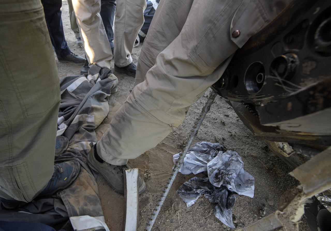 Russian Search and Rescue teams work around the Soyuz MS-08 spacecraft shortly after it landed with Expedition 56 Commander Drew Feustel and Flight Engineer Ricky Arnold of NASA, along with Flight Engineer and Soyuz Commander Oleg Artemyev of Roscosmos near the town of Zhezkazgan, Kazakhstan on Thursday, Oct. 4, 2018. Feustel, Arnold, and Artemyev are returning after 197 days in space where they served as members of the Expedition 55 and 56 crews onboard the International Space Station. Photo Credit: (NASA/Bill Ingalls)