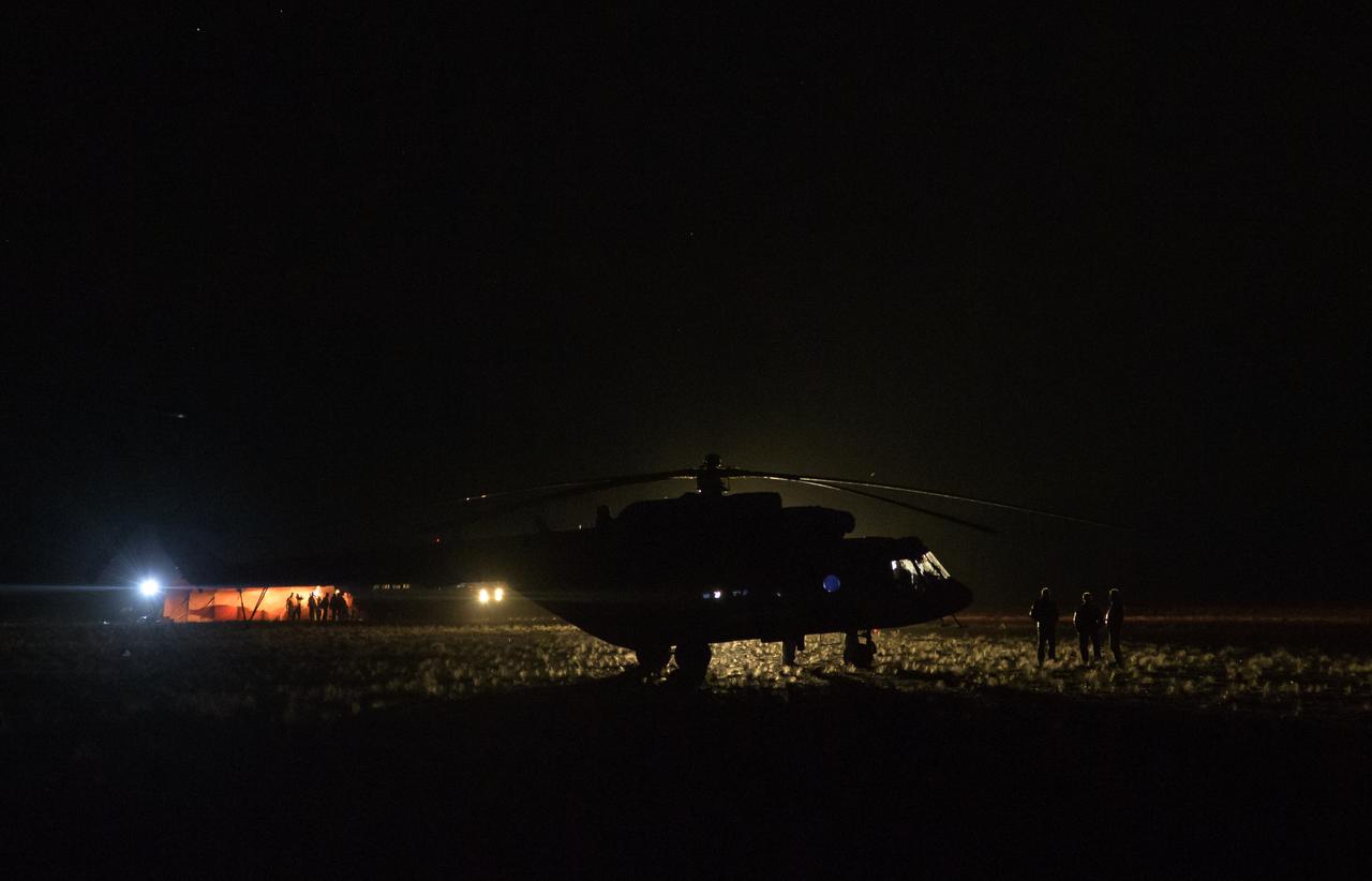 A Russian MI-8 helicopter waits to take Expedition 56 Commander Drew Feustel of NASA from the Soyuz MS-08 landing site to the Karaganda Airport in Kazakhstan on Thursday, Oct. 4, 2018. Feustel, Expedition 56 Flight Engineer Ricky Arnold of NASA, and Expedition 56 Flight Engineer and Soyuz Commander Oleg Artemyev of Roscosmos returned after 197 days in space where they served as members of the Expedition 55 and 56 crews onboard the International Space Station. Photo Credit: (NASA/Bill Ingalls)