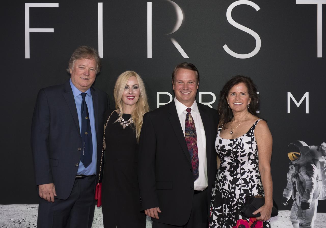 Neil Armstrong's sons, Mark, left, and Rick, second from right, attend the premiere of Universal's feature film "First Man” Thursday, Oct. 4, 2018 at the Smithsonian National Air and Space Museum in Washington. The movie is based on the book by Jim Hansen that chronicles the life of NASA astronaut Neil Armstrong from test pilot to his historic Moon landing. It was directed by Damien Chazelle and stars Ryan Gosling and Claire Foy. Photo Credit: (NASA/Aubrey Gemignani)