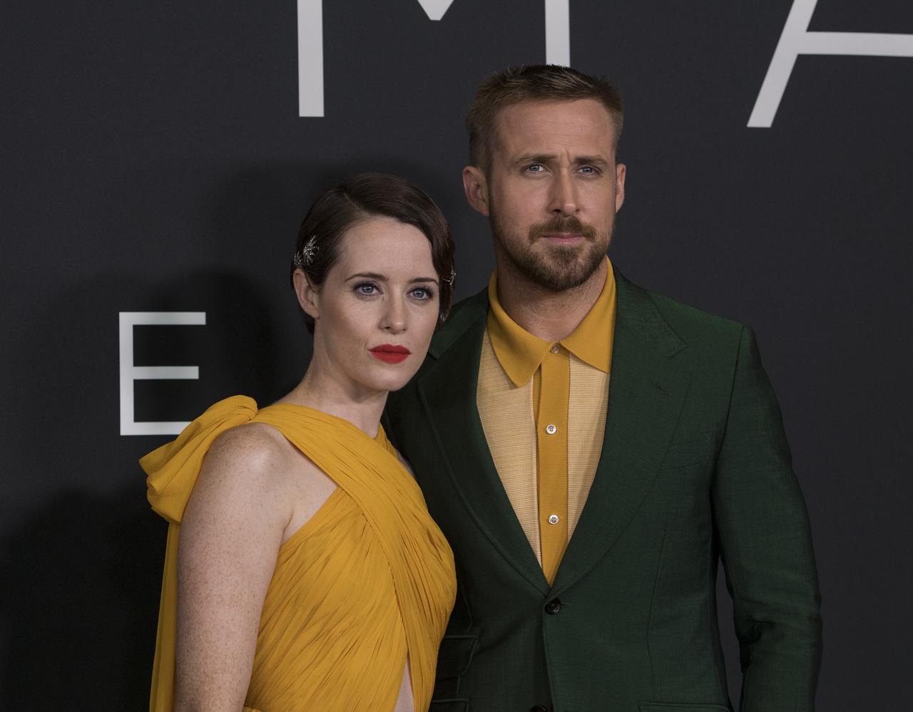 English actress Claire Foy, left, and Canadian actor Ryan Gosling, right, arrive on the red carpet for the premiere of the film "First Man" at the Smithsonian National Air and Space Museum Thursday, Oct. 4, 2018 in Washington. The film is based on the book by Jim Hansen, and chronicles the life of NASA astronaut Neil Armstrong from test pilot to his historic Moon landing. Photo Credit: (NASA/Aubrey Gemignani)