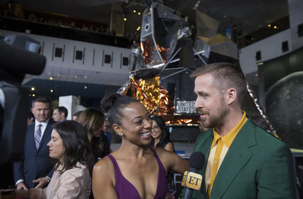 Canadian actor Ryan Gosling is interviewed by Entertainment Tonight after arriving on the red carpet for the premiere of the film "First Man" at the Smithsonian National Air and Space Museum Thursday, Oct. 4, 2018 in Washington. The film is based on the book by Jim Hansen, and chronicles the life of NASA astronaut Neil Armstrong from test pilot to his historic Moon landing. Photo Credit: (NASA/Aubrey Gemignani)