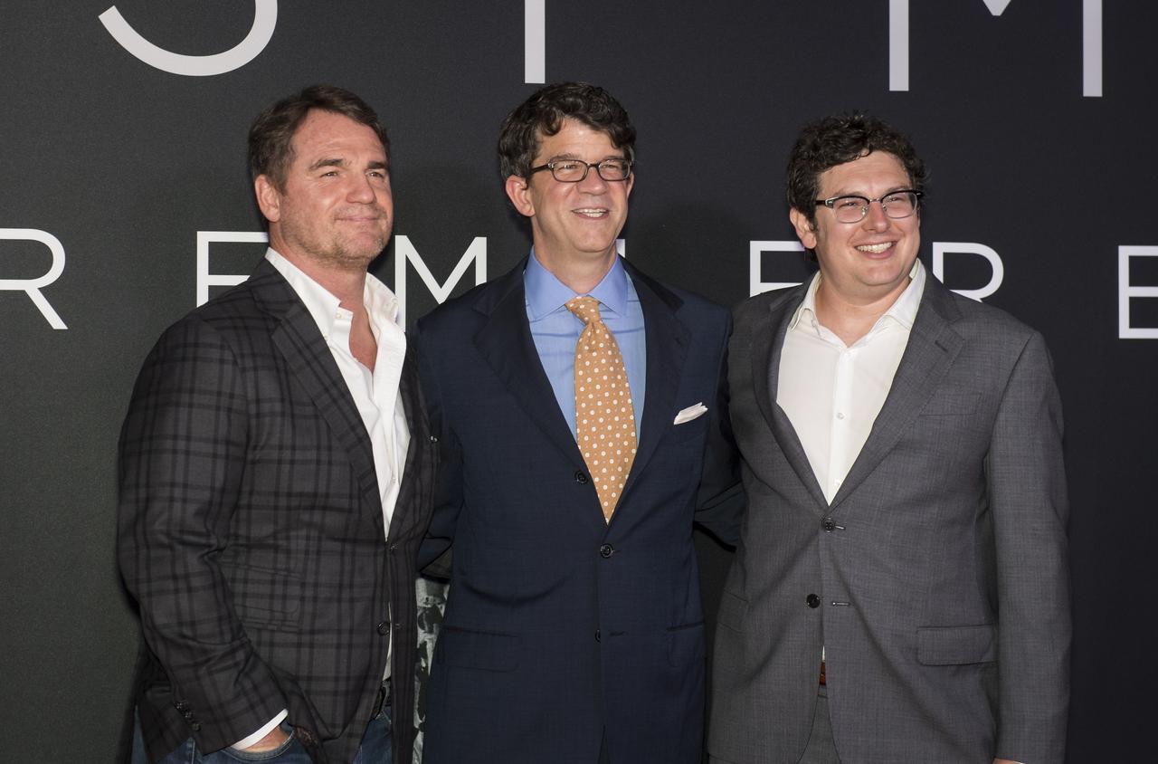 From left to right, producers Marty Bowen, Wyck Godfrey, and Isaac Klausner attend the premiere of Universal's feature film "First Man” Thursday, Oct. 4, 2018 at the Smithsonian National Air and Space Museum in Washington. The movie is based on the book by Jim Hansen that chronicles the life of NASA astronaut Neil Armstrong from test pilot to his historic Moon landing. It was directed by Damien Chazelle and stars Ryan Gosling and Claire Foy. Photo Credit: (NASA/Aubrey Gemignani)