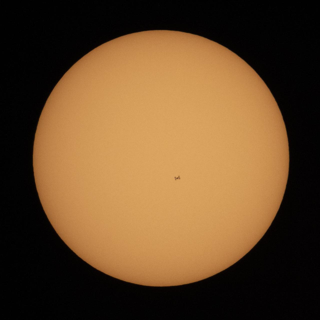 The International Space Station, with a crew of three onboard, is seen in silhouette as it transits the Sun at roughly five miles per second, Sunday, Oct. 7, 2018 from Suffolk, Va. Onboard are Expedition 57 Commander Alexander Gerst of ESA (European Space Agency), Serena Auñón-Chancellor of NASA, and Sergey Prokopyev of Roscosmos. The trio will soon be joined by Nick Hague of NASA and Alexey Ovchinin of Roscosmos, who are scheduled to launch on October 11 from the Baikonur Cosmodrome in Kazakhstan. Photo Credit: (NASA/Joel Kowsky)