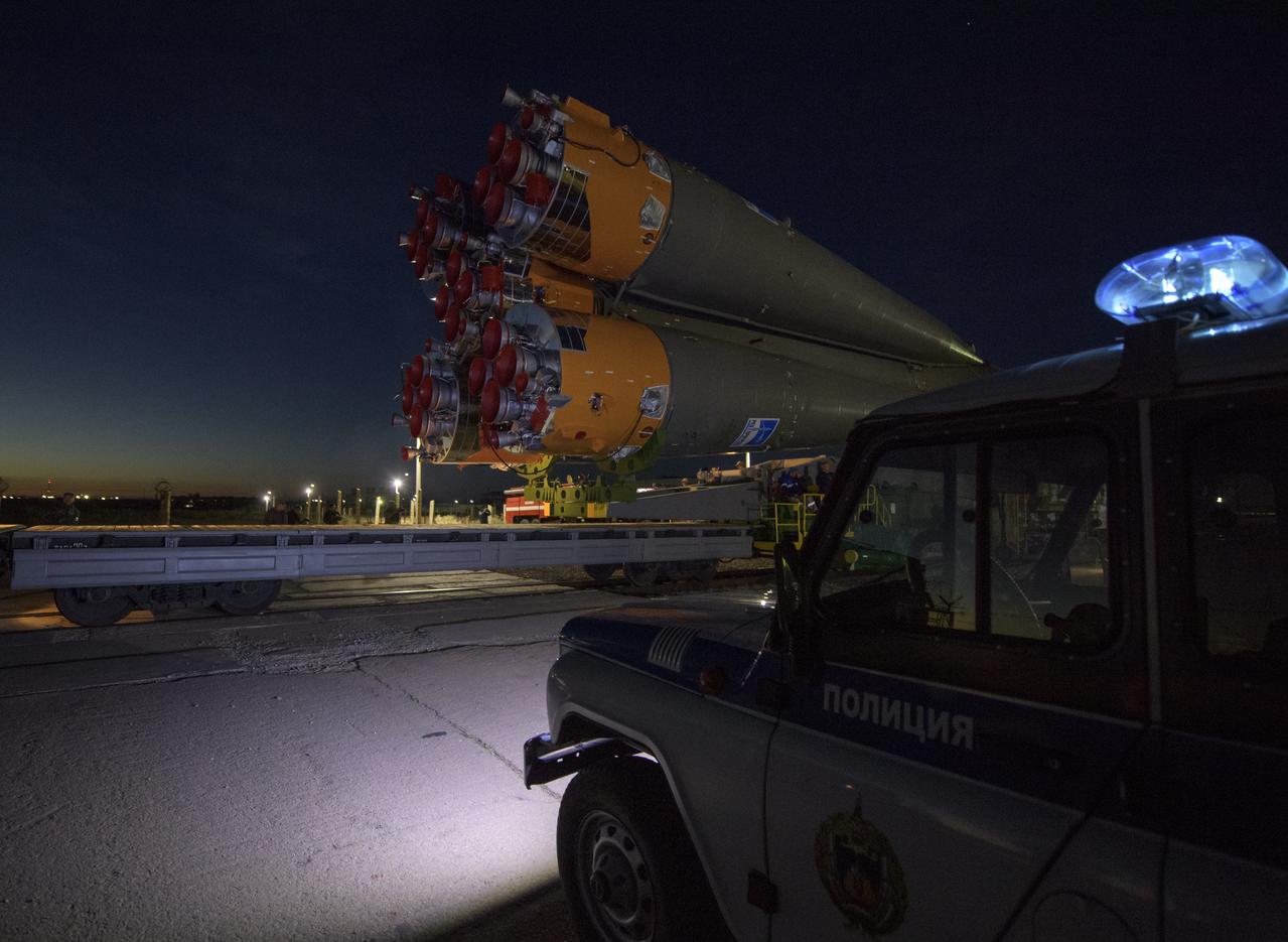 The Soyuz rocket is rolled out by train to the launch pad, Tuesday, Oct. 9, 2018 at the Baikonur Cosmodrome in Kazakhstan. Expedition 57 crewmembers Nick Hague of NASA and Alexey Ovchinin of Roscosmos are scheduled to launch on October 11 and will spend the next six months living and working aboard the International Space Station. Photo Credit: (NASA/Bill Ingalls)