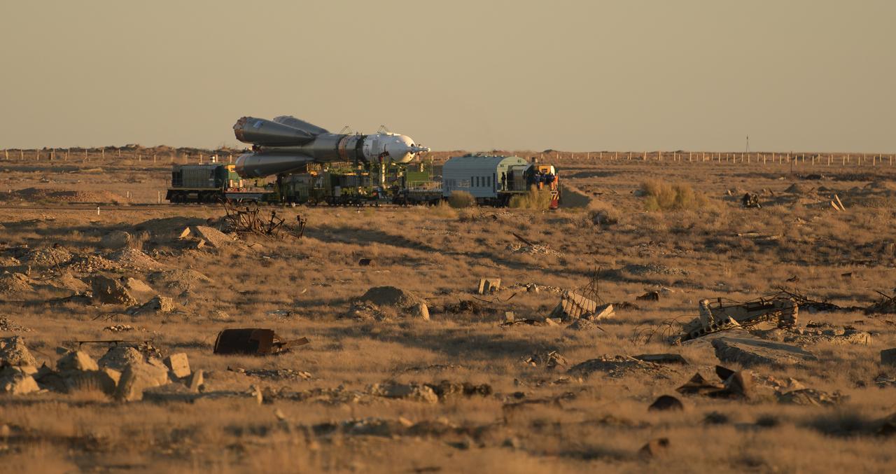 The Soyuz rocket is rolled out by train to the launch pad, Tuesday, Oct. 9, 2018 at the Baikonur Cosmodrome in Kazakhstan. Expedition 57 crewmembers Nick Hague of NASA and Alexey Ovchinin of Roscosmos are scheduled to launch on October 11 and will spend the next six months living and working aboard the International Space Station. Photo Credit: (NASA/Bill Ingalls)