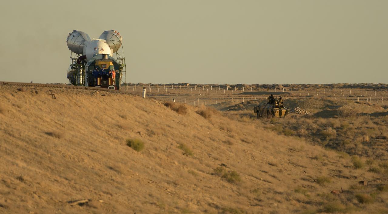 The Soyuz rocket is rolled out by train to the launch pad, Tuesday, Oct. 9, 2018 at the Baikonur Cosmodrome in Kazakhstan. Expedition 57 crewmembers Nick Hague of NASA and Alexey Ovchinin of Roscosmos are scheduled to launch on October 11 and will spend the next six months living and working aboard the International Space Station. Photo Credit: (NASA/Bill Ingalls)