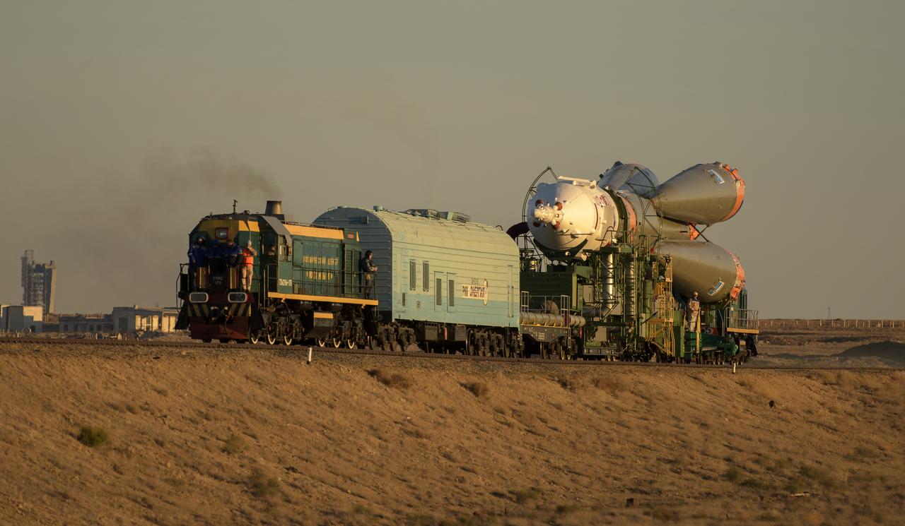 The Soyuz rocket is rolled out by train to the launch pad, Tuesday, Oct. 9, 2018 at the Baikonur Cosmodrome in Kazakhstan. Expedition 57 crewmembers Nick Hague of NASA and Alexey Ovchinin of Roscosmos are scheduled to launch on October 11 and will spend the next six months living and working aboard the International Space Station. Photo Credit: (NASA/Bill Ingalls)