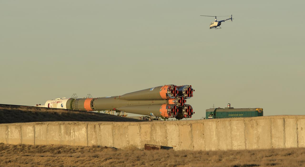 The Soyuz rocket is rolled out by train to the launch pad, Tuesday, Oct. 9, 2018 at the Baikonur Cosmodrome in Kazakhstan. Expedition 57 crewmembers Nick Hague of NASA and Alexey Ovchinin of Roscosmos are scheduled to launch on October 11 and will spend the next six months living and working aboard the International Space Station. Photo Credit: (NASA/Bill Ingalls)