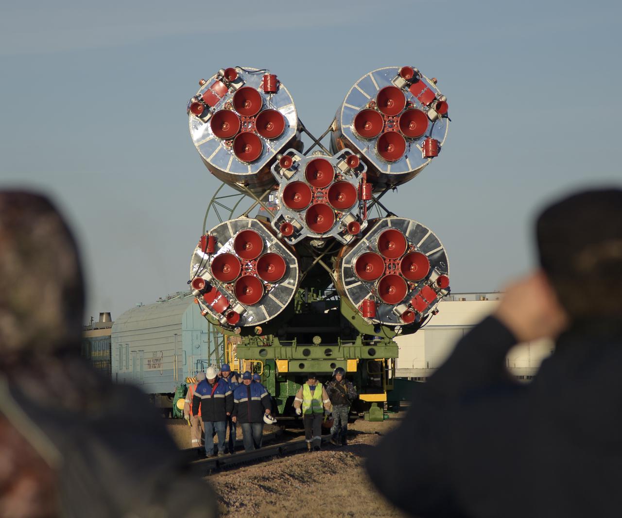 The Soyuz rocket is rolled out by train to the launch pad, Tuesday, Oct. 9, 2018 at the Baikonur Cosmodrome in Kazakhstan. Expedition 57 crewmembers Nick Hague of NASA and Alexey Ovchinin of Roscosmos are scheduled to launch on October 11 and will spend the next six months living and working aboard the International Space Station. Photo Credit: (NASA/Bill Ingalls)