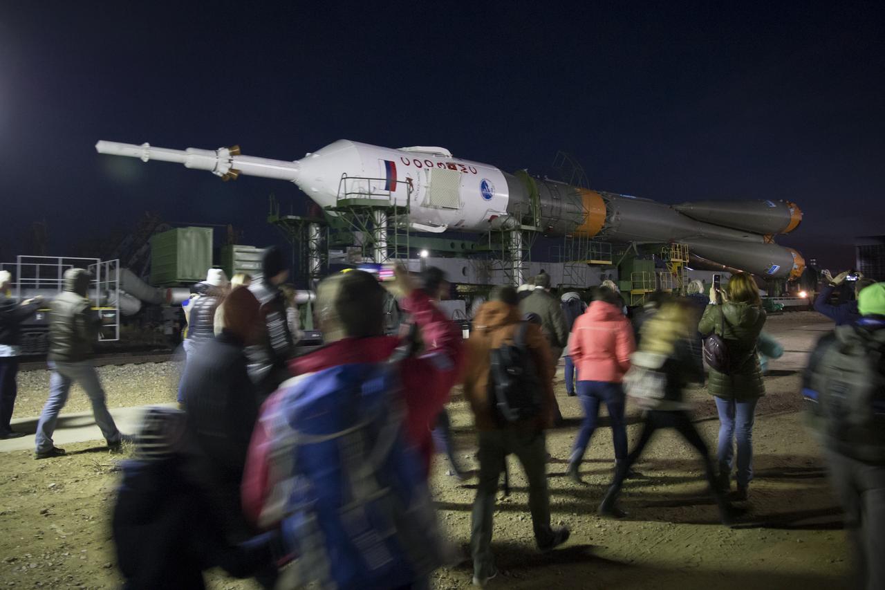 The Soyuz rocket is rolled out by train to the launch pad, Tuesday, Oct. 9, 2018 at the Baikonur Cosmodrome in Kazakhstan. Expedition 57 crewmembers Nick Hague of NASA and Alexey Ovchinin of Roscosmos are scheduled to launch on October 11 and will spend the next six months living and working aboard the International Space Station. Photo Credit: (NASA/Victor Zelentsov)