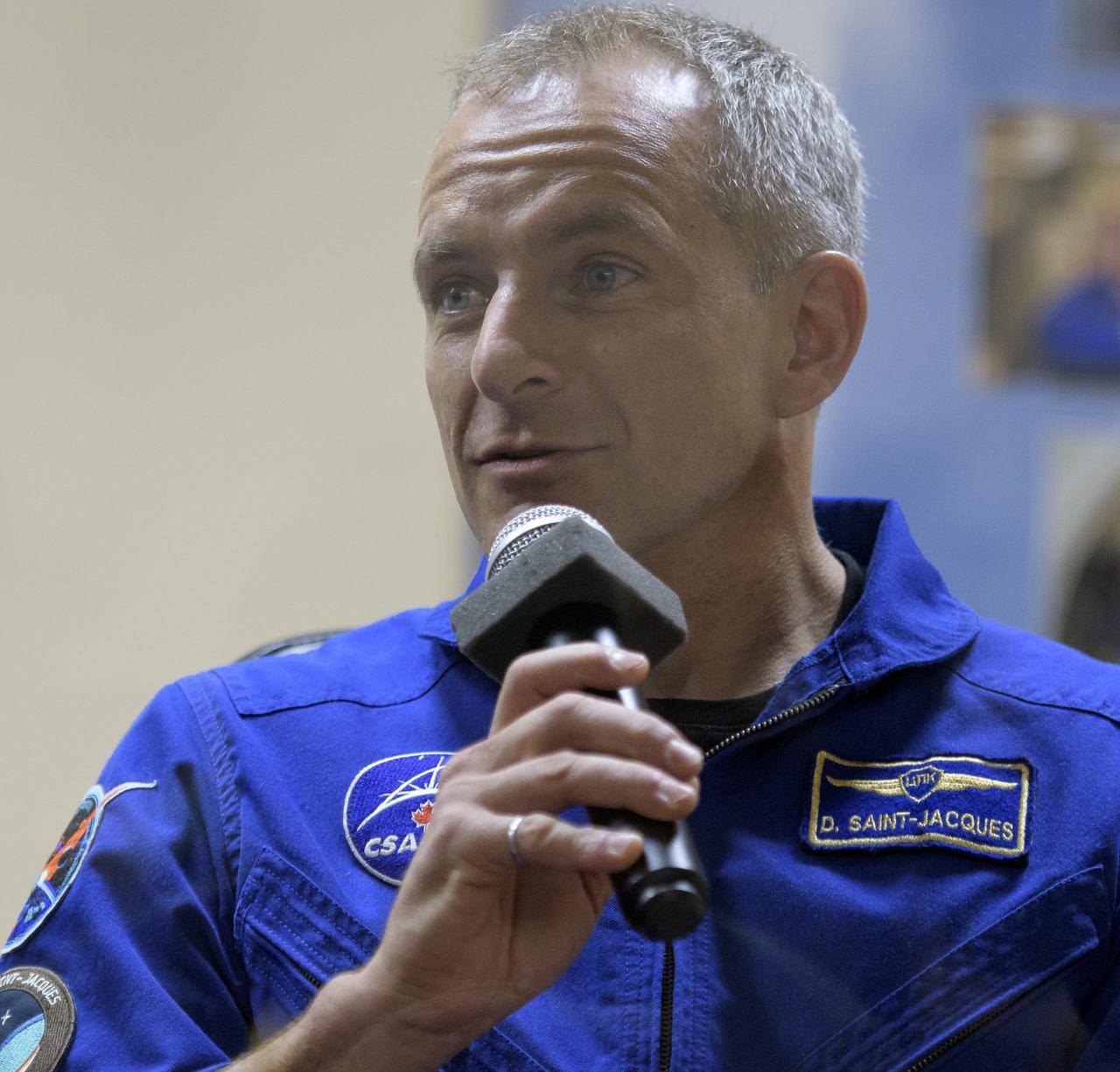 Expedition 57 backup crewmember David Saint-Jacques of the Canadian Space Agency is seen during a press conference, Wednesday, Oct. 10, 2018 at the Cosmonaut Hotel in Baikonur, Kazakhstan. Expedition 57 Flight Engineer Nick Hague of NASA and Flight Engineer Alexey Ovchinin of Roscosmos are scheduled to launch on October 11 and will spend the next six months living and working aboard the International Space Station. Photo Credit: (NASA/Bill Ingalls)