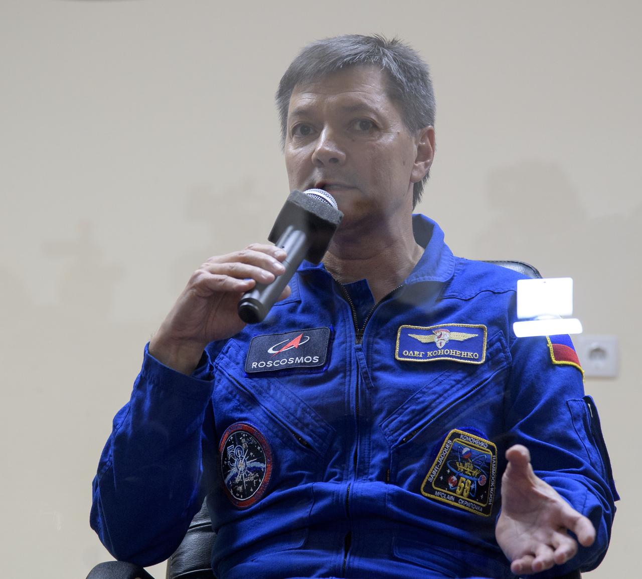 Expedition 57 backup crewmember Oleg Kononenko of Roscosmos answers questions during a press conference, Wednesday, Oct. 10, 2018 at the Cosmonaut Hotel in Baikonur, Kazakhstan. Expedition 57 Flight Engineer Nick Hague of NASA and Flight Engineer Alexey Ovchinin of Roscosmos are scheduled to launch on October 11 and will spend the next six months living and working aboard the International Space Station. Photo Credit: (NASA/Bill Ingalls)