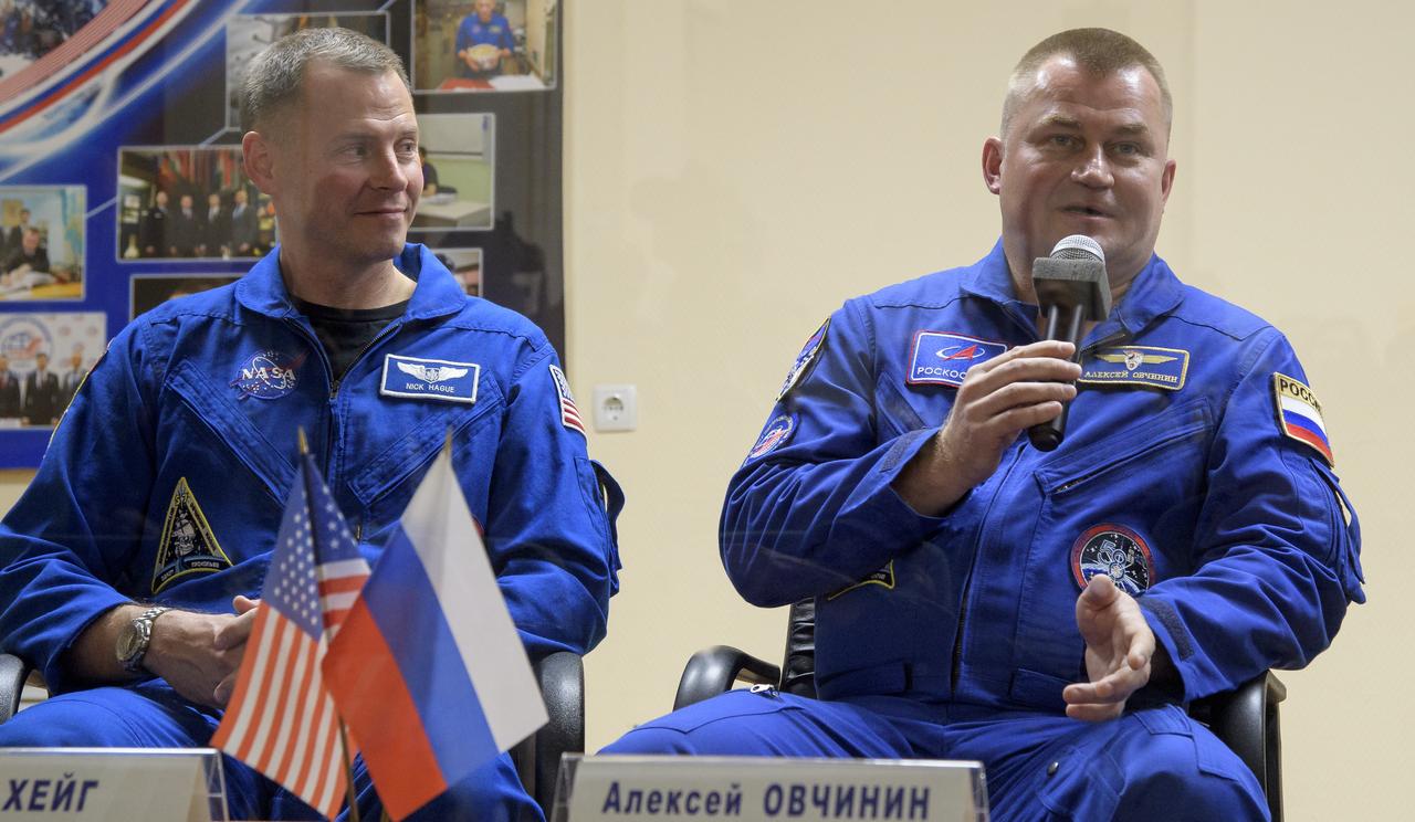 Expedition 57 prime crew members Nick Hague, left, Alexey Ovchinin are seen during a press conference, Wednesday, Oct. 10, 2018 at the Cosmonaut Hotel in Baikonur, Kazakhstan. Hague and Ovchinin are scheduled to launch on October 11 and will spend the next six months living and working aboard the International Space Station. Photo Credit: (NASA/Bill Ingalls)