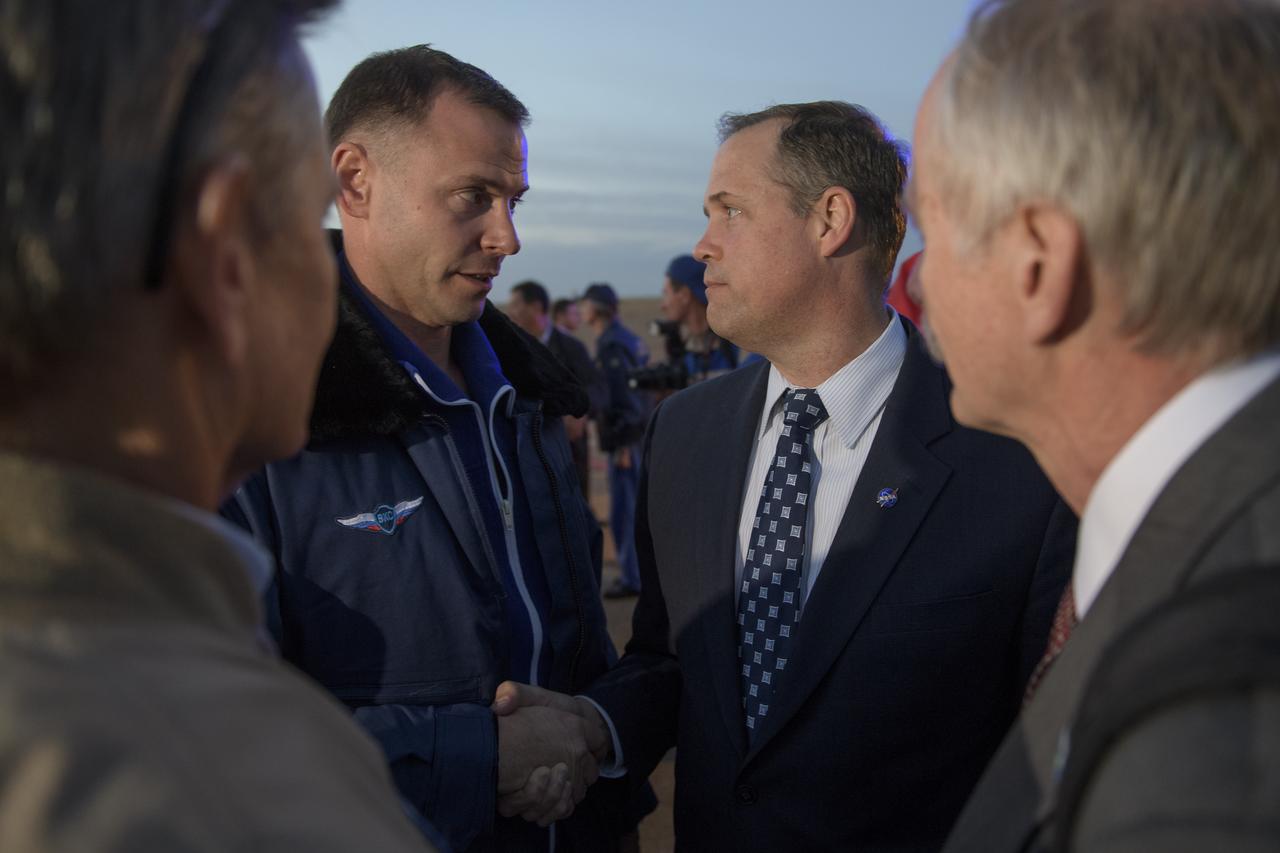 Expedition 57 Flight Engineer Nick Hague of NASA, left, is welcomed by NASA Administrator Jim Bridenstine after Hague landed at the Krayniy Airport with Expedition 57 Flight Engineer Alexey Ovchinin of Roscosmos, Thursday, Oct. 11, 2018 in Baikonur, Kazakhstan. Hague and Ovchinin arrived from Zhezkazgan after Russian Search and Rescue teams brought them from the Soyuz landing site. During the Soyuz MS-10 spacecraft's climb to orbit, an anomaly occurred, resulting in an abort downrange. The crew was quickly recovered and is in good condition. Photo Credit: (NASA/Bill Ingalls)