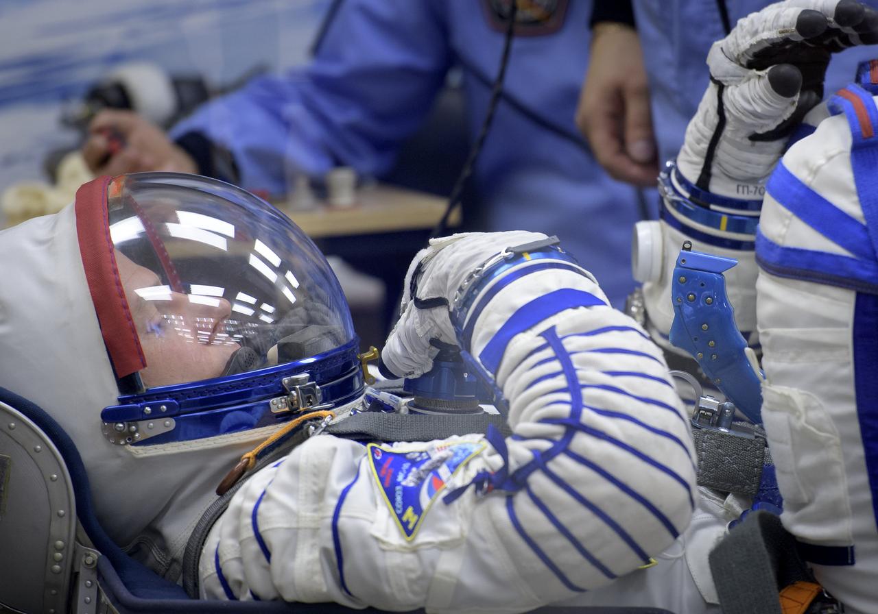 Expedition 57 Flight Engineer Nick Hague of NASA has his Sokol suit pressure checked ahead of his launch on a Soyuz rocket with Flight Engineer Alexey Ovchinin of Roscosmos, Thursday, Oct. 11, 2018 at the Baikonur Cosmodrome in Kazakhstan. During the Soyuz spacecraft's climb to orbit, an anomaly occurred, resulting in an abort downrange. The crew was quickly recovered and is in good condition. Photo Credit: (NASA/Bill Ingalls)