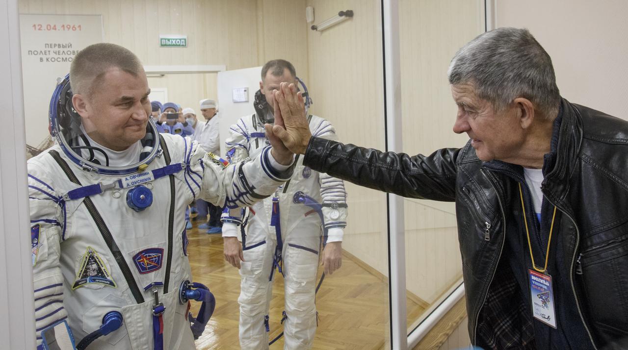 Expedition 57 Flight Engineer Alexey Ovchinin of Roscosmos says farewell to his father after having his Sokol suit pressure checked ahead of his launch on a Soyuz rocket with Flight Engineer Nick Hague of NASA, Thursday, Oct. 11, 2018 at the Baikonur Cosmodrome in Kazakhstan. During the Soyuz spacecraft's climb to orbit, an anomaly occurred, resulting in an abort downrange. The crew was quickly recovered and is in good condition. Photo Credit: (NASA/Victor Zelentsov)