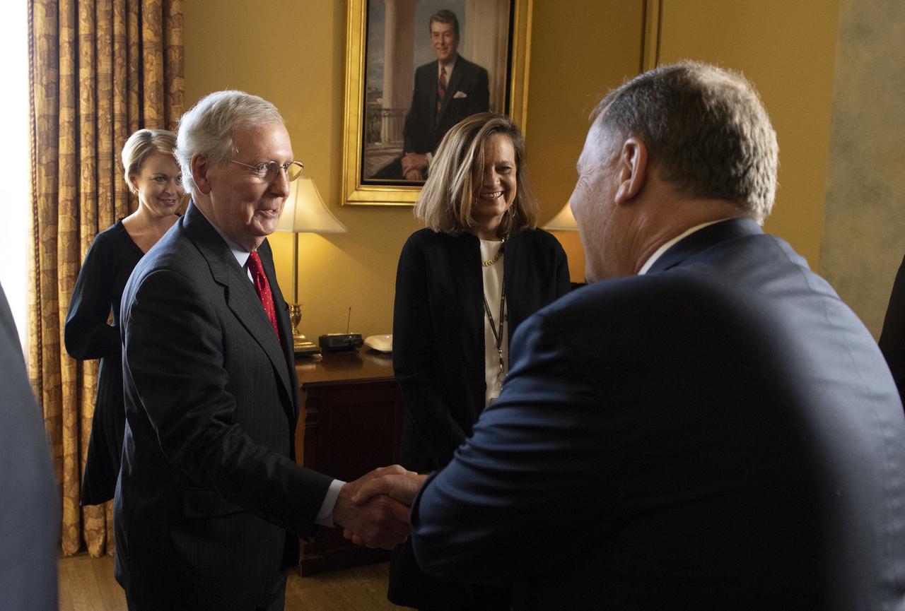 Jim Morhard, right, shakes hands with Senate Majority Leader Mitch McConnell, R-Ky., before being sworn in as the 14th NASA Deputy Administrator, Wednesday, Oct. 17, 2018 in the U.S. Capitol. Photo Credit: (NASA/Joel Kowsky)