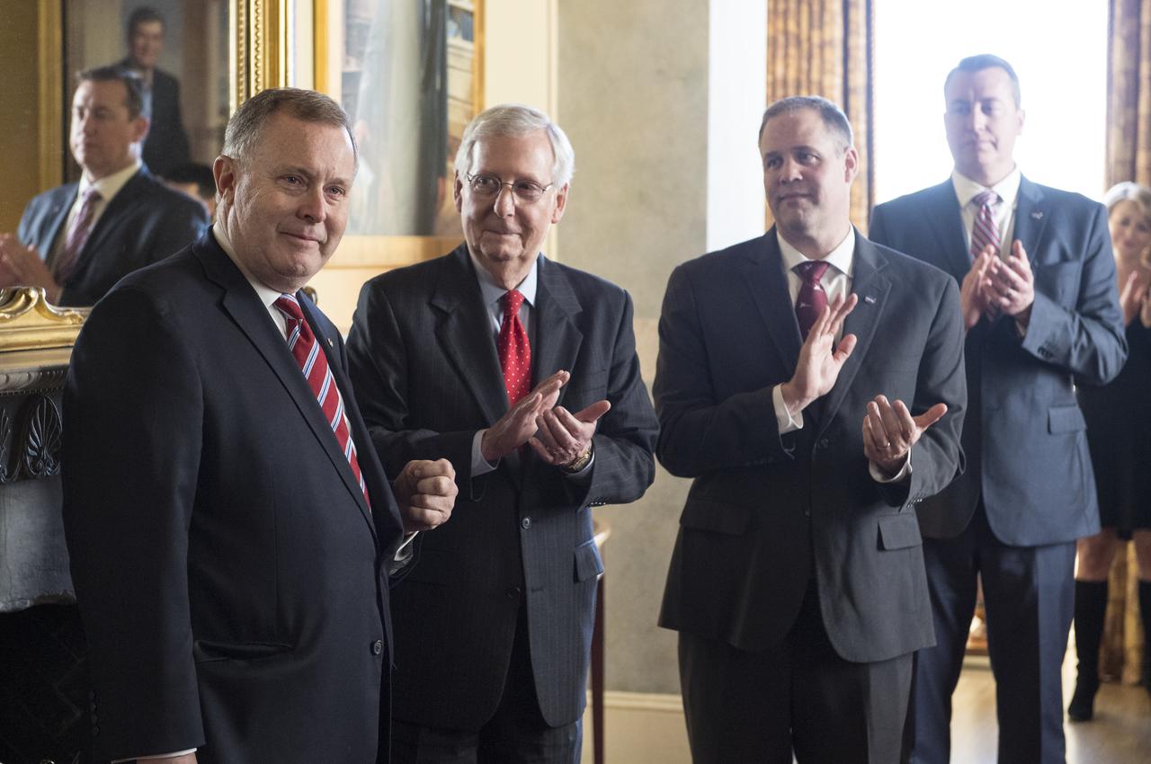 Jim Morhard, left, speaks after being sworn in as the 14th NASA Deputy Administrator as Senate Majority Leader Mitch McConnell, R-Ky., second from left, NASA Administrator Jim Bridenstine, second from right and NASA Chief Financial Officer Jeff DeWit, right, look on, Wednesday, Oct. 17, 2018 in the U.S. Capitol. Photo Credit: (NASA/Joel Kowsky)