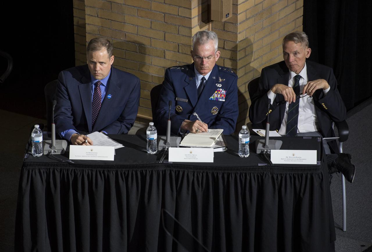 NASA Administrator Jim Bridenstine, left, General Paul Selva, vice chairman, Joint Chiefs of Staff, center, and Dr. William Happer, deputy assistant to the president, National Security Council, listen as Vice President Mike Pence delivers opening remarks during the National Space Council meeting titled, Moon, Mars, and Worlds Beyond, Winning the Next Frontier, Tuesday, Oct. 23, 2018 at the National War College at Fort Lesley J. McNair in Washington. Chaired by the Vice President, the council's role is to advise the President regarding national space policy and strategy, and review the nation's long-range goals for space activities.Photo Credit: (NASA/Aubrey Gemignani)