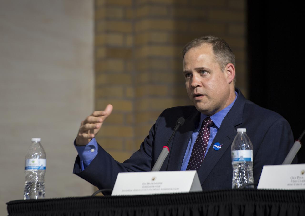 NASA Administrator Jim Bridenstine asks panelists a question during the National Space Council meeting titled, Moon, Mars, and Worlds Beyond, Winning the Next Frontier, Tuesday, Oct. 23, 2018 at the National War College at Fort Lesley J. McNair in Washington. Chaired by the Vice President, the council's role is to advise the President regarding national space policy and strategy, and review the nation's long-range goals for space activities.Photo Credit: (NASA/Aubrey Gemignani)