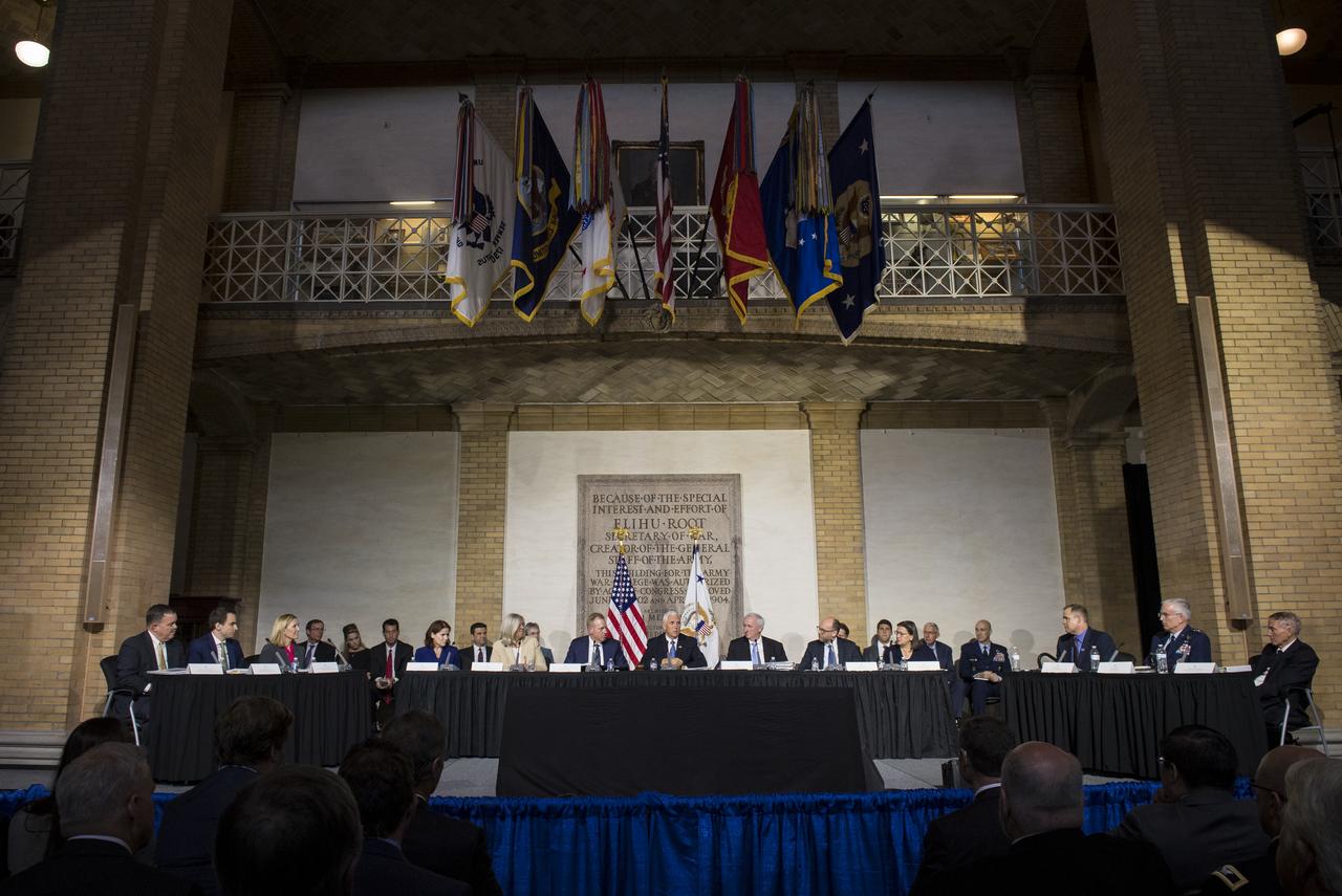 Members of the National Space Council are seen during a meeting titled, Moon, Mars, and Worlds Beyond, Winning the Next Frontier, at the National War College at Fort Lesley J. McNair, Tuesday, Oct. 23, 2018, in Washington. Chaired by the Vice President, the council's role is to advise the President regarding national space policy and strategy, and review the nation's long-range goals for space activities. Photo Credit: (NASA/Aubrey Gemignani)