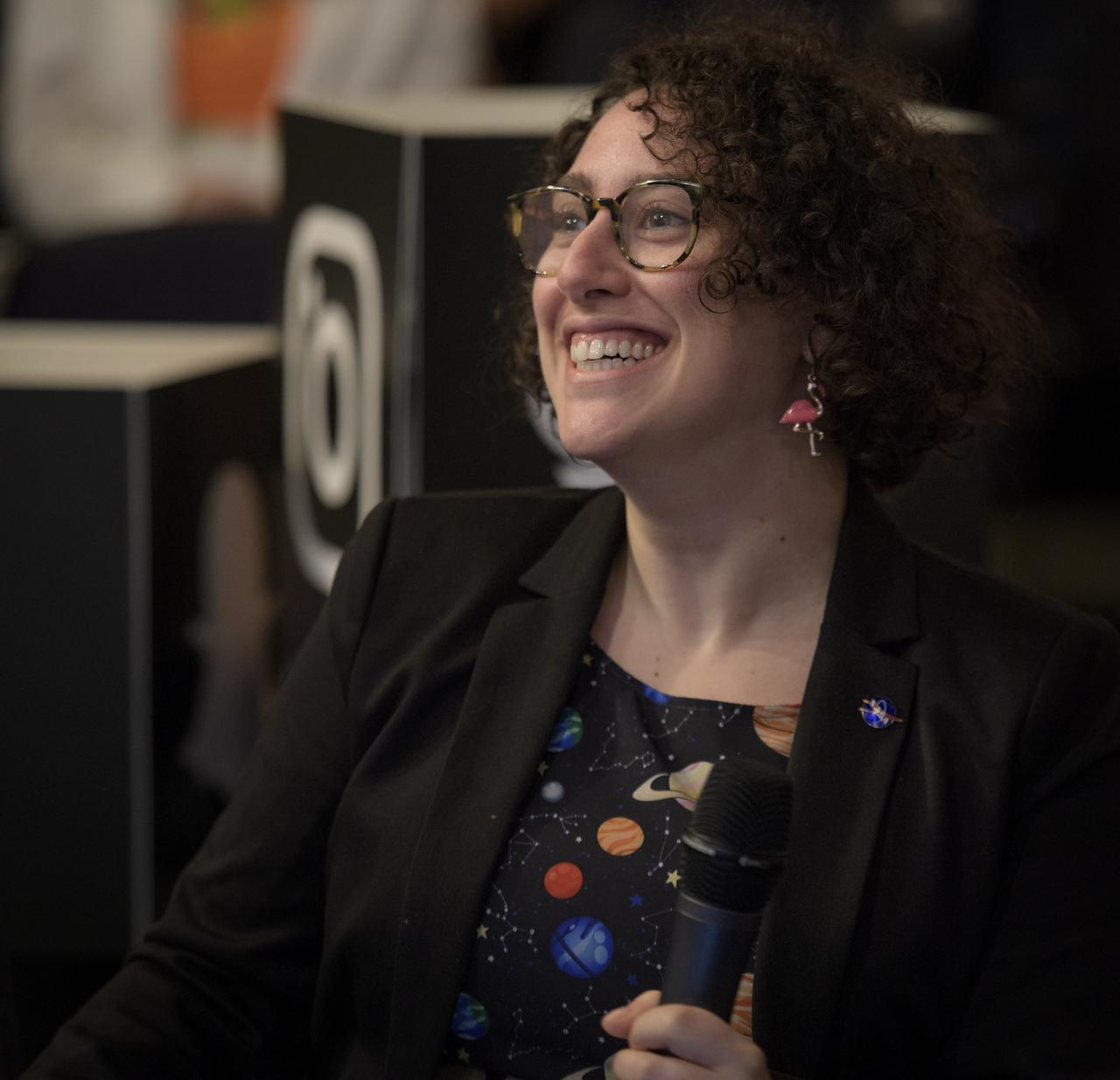 JoAnna Wendel of NASA Headquarters ask questions from the social media during the NASA InSight Mars Lander (Interior Exploration using Seismic Investigations, Geodesy and Heat Transport) media briefing, Wednesday, Oct. 31, 2018 at NASA Headquarters in Washington. InSIght will land on the Red Planet at approximately 3 p.m. EST (noon PST) Monday, Nov. 26. InSight will study the deep interior of Mars to learn how all celestial bodies with rocky surfaces, including Earth and the Moon, formed. The lander’s instruments include a seismometer to detect marsquakes and a probe to monitor the flow of heat in the planet's subsurface. Photo Credit: (NASA/Bill Ingalls)