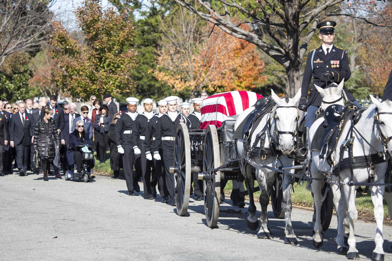A horse drawn caisson carries former astronaut Alan Bean to his final resting place during an interment ceremony, Thursday, Nov. 8, 2018 at Arlington National Cemetery in Virginia. Selected as an astronaut in 1963, Bean flew in space twice, becoming the fourth human to walk on the Moon on Nov. 19, 1969 and spent 59 days in space as commander of the second Skylab mission in 1973. Photo Credit: (NASA/Joel Kowsky)