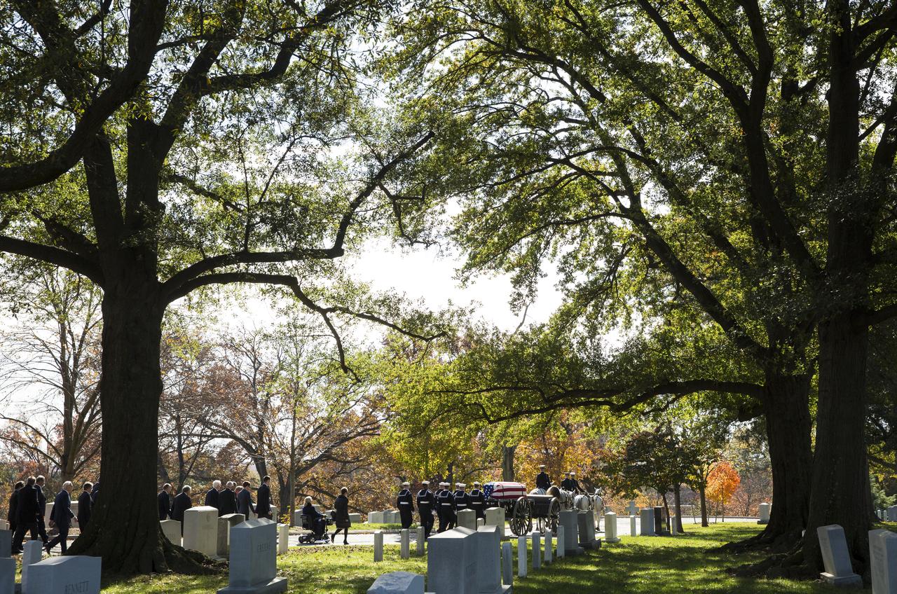 A horse drawn caisson carries former astronaut Alan Bean to his final resting place during an interment ceremony, Thursday, Nov. 8, 2018 at Arlington National Cemetery in Virginia. Selected as an astronaut in 1963, Bean flew in space twice, becoming the fourth human to walk on the Moon on Nov. 19, 1969 and spent 59 days in space as commander of the second Skylab mission in 1973. Photo Credit: (NASA/Joel Kowsky)