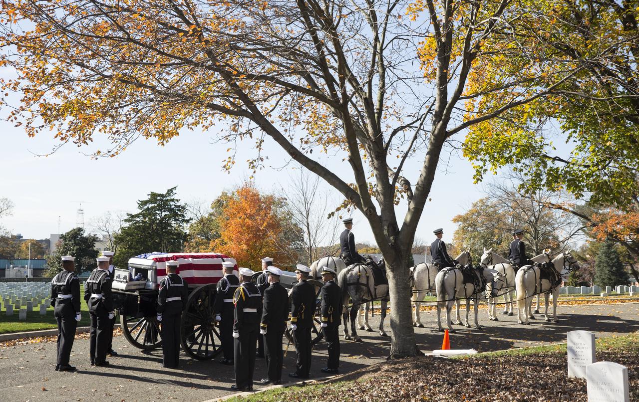 A horse drawn caisson carries former astronaut Alan Bean to his final resting place during an interment ceremony, Thursday, Nov. 8, 2018 at Arlington National Cemetery in Virginia. Selected as an astronaut in 1963, Bean flew in space twice, becoming the fourth human to walk on the Moon on Nov. 19, 1969 and spent 59 days in space as commander of the second Skylab mission in 1973. Photo Credit: (NASA/Joel Kowsky)
