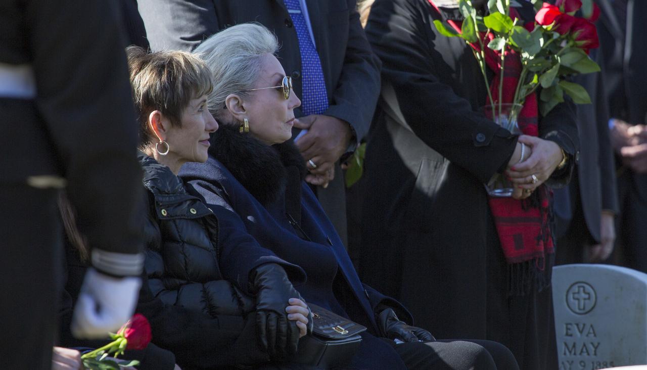 Leslie Bean, wife of former astronaut Alan Bean, is seen during his interment service, Thursday, Nov. 8, 2018 at Arlington National Cemetery in Virginia. Selected as an astronaut in 1963, Bean flew in space twice, becoming the fourth human to walk on the Moon on Nov. 19, 1969 and spent 59 days in space as commander of the second Skylab mission in 1973. Photo Credit: (NASA/Joel Kowsky)