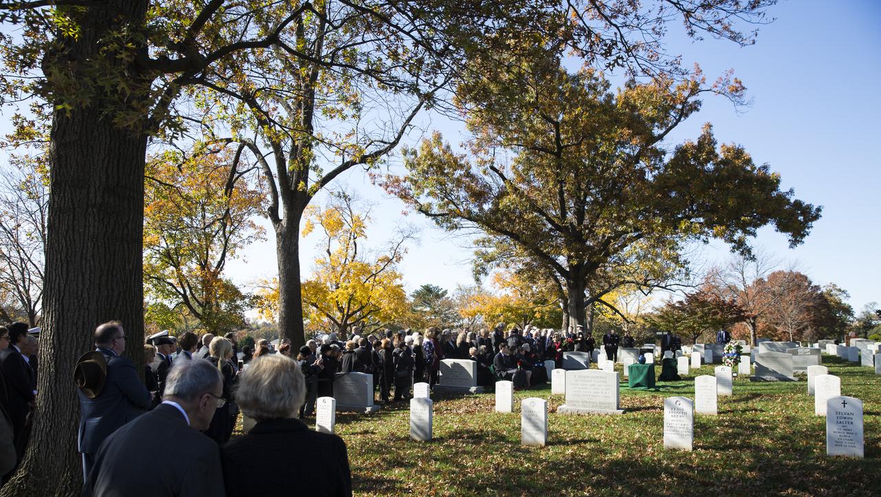 Family and friends of former astronaut Alan Bean are seen during interment services, Thursday, Nov. 8, 2018 at Arlington National Cemetery in Virginia. Selected as an astronaut in 1963, Bean flew in space twice, becoming the fourth human to walk on the Moon on Nov. 19, 1969 and spent 59 days in space as commander of the second Skylab mission in 1973. Photo Credit: (NASA/Joel Kowsky)