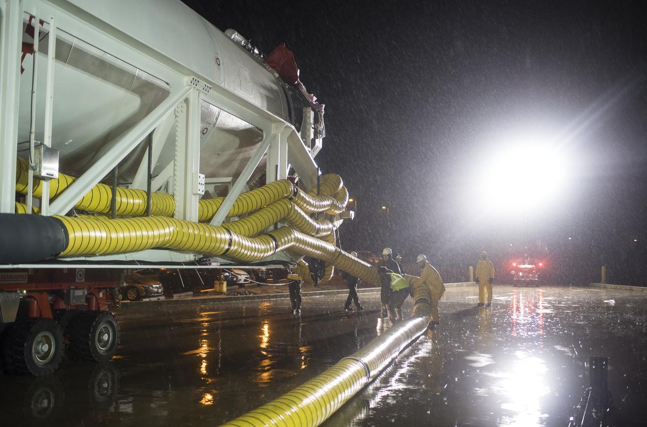 A Northrop Grumman Antares rocket is seen as it is rolled from the Horizontal Integration Facility (HIF) to Pad-0A, Monday, Nov. 12, 2018 at NASA's Wallops Flight Facility in Virginia. Northrop Grumman's 10th contracted cargo resupply mission for NASA to the International Space Station will deliver about 7,500 pounds of science and research, crew supplies and vehicle hardware to the orbital laboratory and its crew. Launch is scheduled for Nov. 15 at 4:49 a.m. EST. Photo Credit: (NASA/Joel Kowsky)
