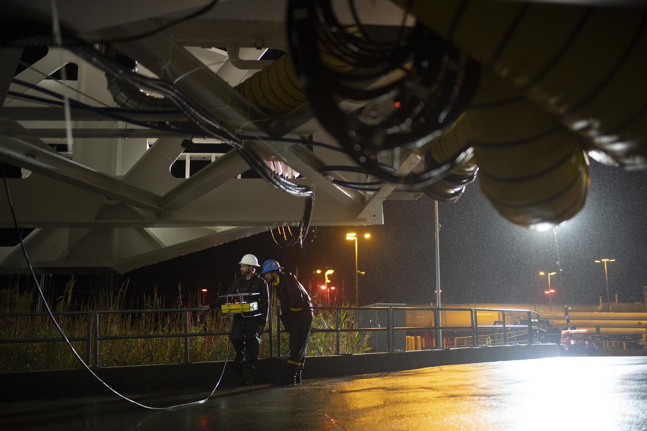 A Northrop Grumman Antares rocket is seen as arrives at Pad-0A, Monday, Nov. 12, 2018 at NASA's Wallops Flight Facility in Virginia. Northrop Grumman's 10th contracted cargo resupply mission for NASA to the International Space Station will deliver about 7,500 pounds of science and research, crew supplies and vehicle hardware to the orbital laboratory and its crew. Launch is scheduled for Nov. 15 at 4:49 a.m. EST. Photo Credit: (NASA/Joel Kowsky)