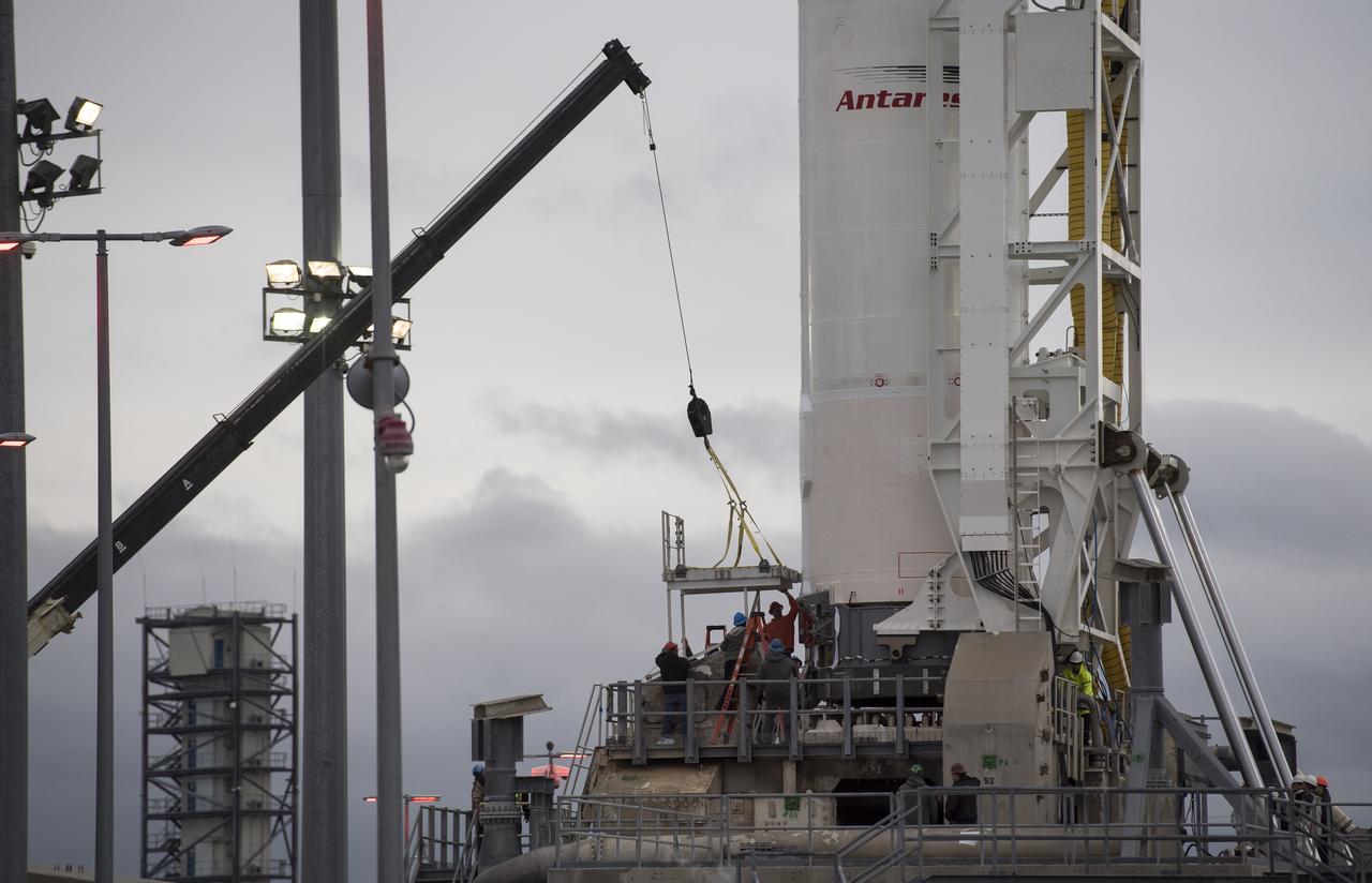 The Northrop Grumman Antares rocket, with Cygnus spacecraft onboard, is seen on Pad-0A, Tuesday, Nov. 13, 2018 at NASA's Wallops Flight Facility in Virginia. Northrop Grumman's 10th contracted cargo resupply mission for NASA to the International Space Station will deliver about 7,500 pounds of science and research, crew supplies and vehicle hardware to the orbital laboratory and its crew. Launch is scheduled for Nov. 15 at 4:49 a.m. EST. Photo Credit: (NASA/Joel Kowsky)