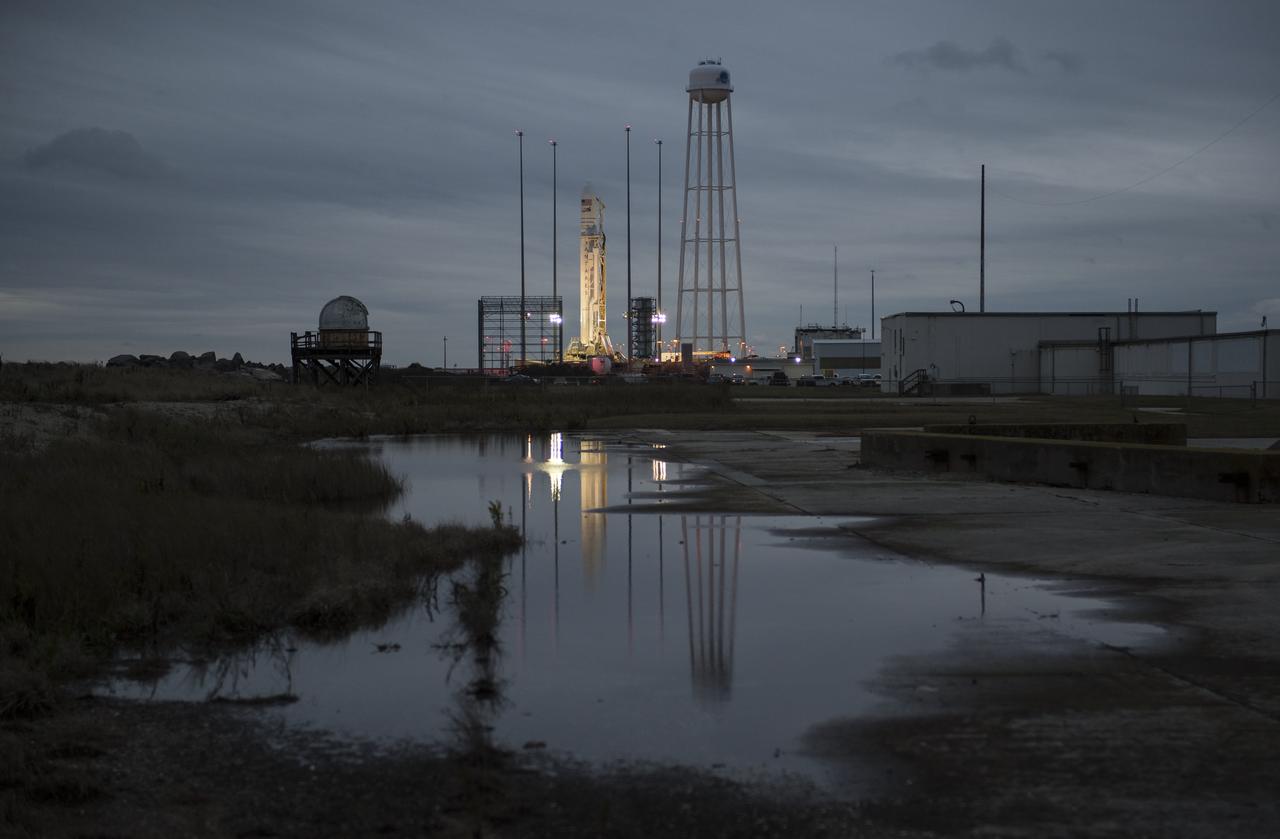 The Northrop Grumman Antares rocket, with Cygnus spacecraft onboard, is seen on Pad-0A, Tuesday, Nov. 13, 2018 at NASA's Wallops Flight Facility in Virginia. Northrop Grumman's 10th contracted cargo resupply mission for NASA to the International Space Station will deliver about 7,500 pounds of science and research, crew supplies and vehicle hardware to the orbital laboratory and its crew. Launch is scheduled for Nov. 15 at 4:49 a.m. EST. Photo Credit: (NASA/Joel Kowsky)