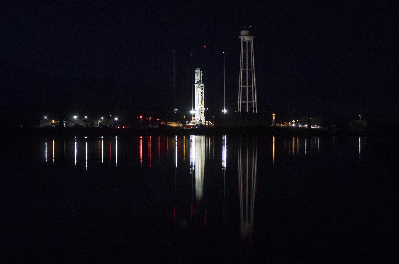 The Northrop Grumman Antares rocket, with Cygnus spacecraft onboard, is seen on Pad-0A, Tuesday, Nov. 13, 2018 at NASA's Wallops Flight Facility in Virginia. Northrop Grumman's 10th contracted cargo resupply mission for NASA to the International Space Station will deliver about 7,500 pounds of science and research, crew supplies and vehicle hardware to the orbital laboratory and its crew. Launch is scheduled for Nov. 15 at 4:49 a.m. EST. Photo Credit: (NASA/Joel Kowsky)A Northrop Grumman Antares rocket is seen as it is rolled from the Horizontal Integration Facility (HIF) to launch Pad-0A, Tuesday, Nov. 13, 2018 at NASA's Wallops Flight Facility in Virginia. Northrop Grumman's tenth contracted cargo resupply mission for NASA to the International Space Station will deliver about 7,500 pounds of science and research, crew supplies and vehicle hardware to the orbital laboratory and its crew. Launch is scheduled for Nov. 15 at 4:49 a.m. EST. Photo Credit: (NASA/Joel Kowsky)