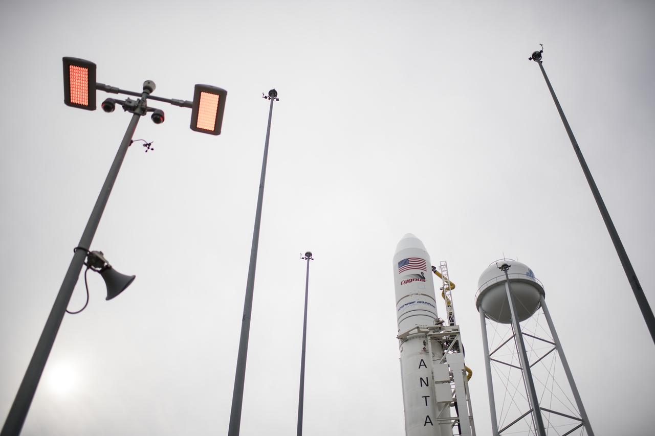 The Northrop Grumman Antares rocket, with Cygnus resupply spacecraft onboard, is seen on Pad-0A, Wednesday, Nov. 14, 2018 at NASA's Wallops Flight Facility in Virginia. Northrop Grumman's 10th contracted cargo resupply mission for NASA to the International Space Station will deliver about 7,400 pounds of science and research, crew supplies and vehicle hardware to the orbital laboratory and its crew. Launch is currently scheduled for Nov. 16 at 4:23 a.m. EST. Photo Credit: (NASA/Joel Kowsky)
