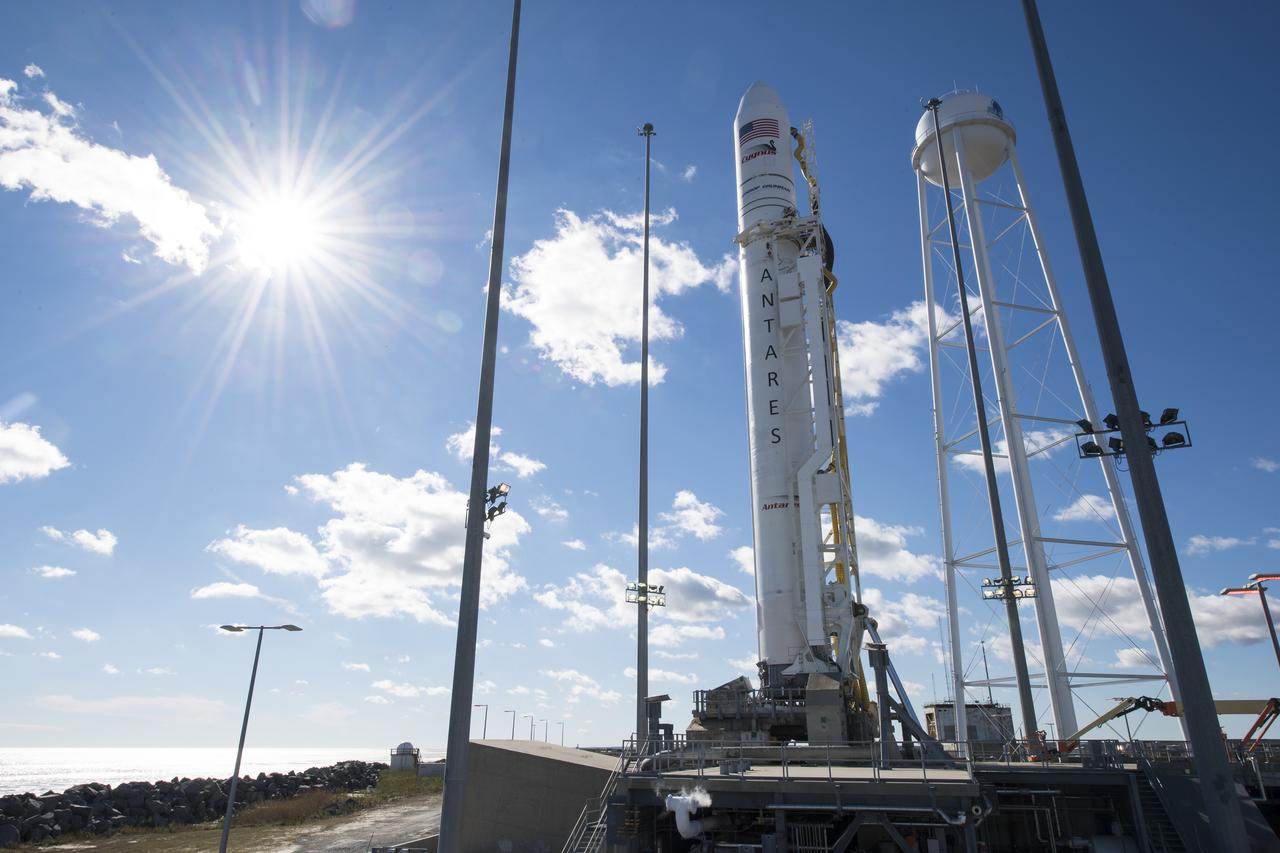 The Northrop Grumman Antares rocket, with Cygnus resupply spacecraft onboard, is seen on Pad-0A, Friday, Nov. 16, 2018 at NASA's Wallops Flight Facility in Virginia. Northrop Grumman's 10th contracted cargo resupply mission for NASA to the International Space Station will deliver about 7,400 pounds of science and research, crew supplies and vehicle hardware to the orbital laboratory and its crew. Launch is currently scheduled for Nov. 17 at 4:01 a.m. EST. Photo Credit: (NASA/Joel Kowsky)