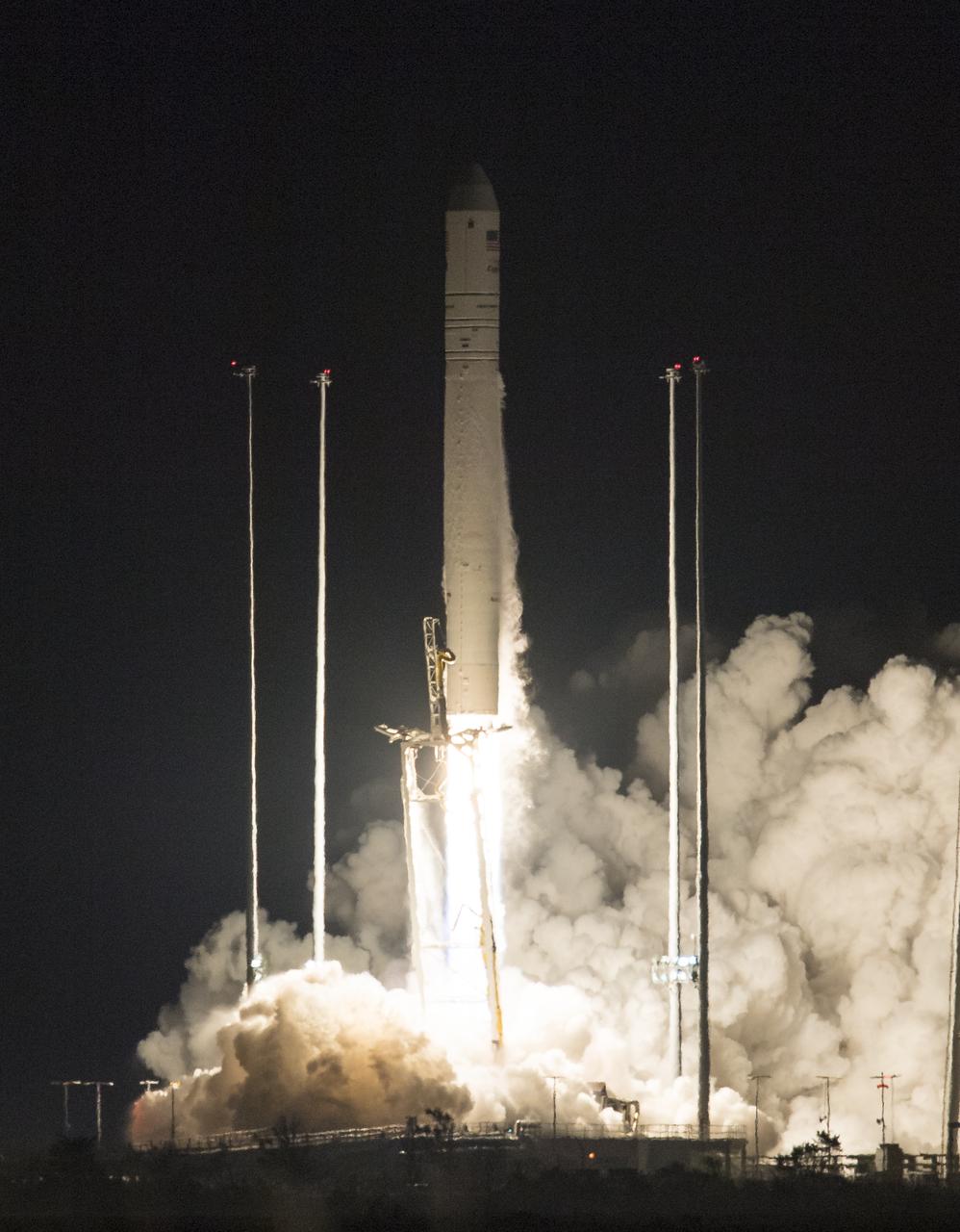 The Northrop Grumman Antares rocket, with Cygnus resupply spacecraft onboard, launches from Pad-0A, Saturday, Nov. 17, 2018 at NASA's Wallops Flight Facility in Virginia. Northrop Grumman's 10th contracted cargo resupply mission for NASA to the International Space Station will deliver about 7,400 pounds of science and research, crew supplies and vehicle hardware to the orbital laboratory and its crew. Photo Credit: (NASA/Joel Kowsky)