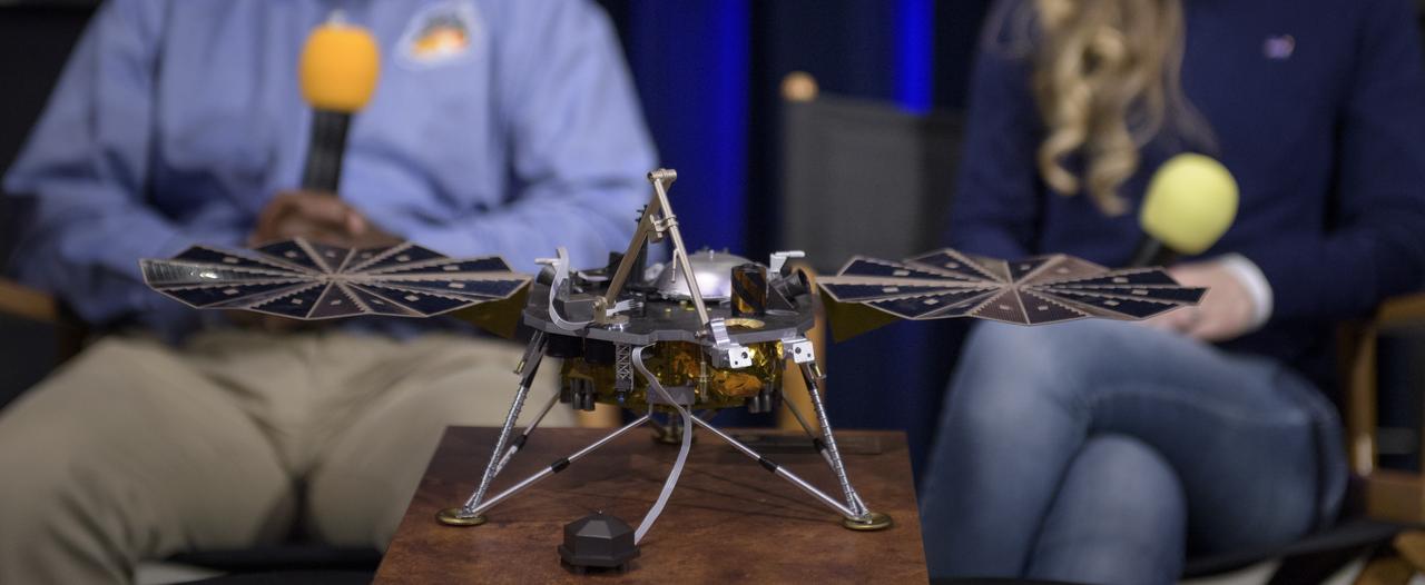 A model of the Mars InSight lander is on display during a social media briefing, Sunday, Nov. 25, 2018 at NASA's Jet Propulsion Laboratory in Pasadena, California.  InSight, short for Interior Exploration using Seismic Investigations, Geodesy and Heat Transport, is a Mars lander designed to study the "inner space" of Mars: its crust, mantle, and core. InSight is scheduled to touch down on the Red Planet at approximately noon PST (3 p.m. EST) on Nov. 26. Photo Credit: (NASA/Bill Ingalls)