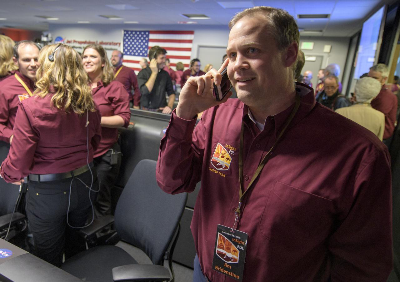 NASA Administrator Jim Bridenstine receives a congratulatory call from Vice President Mike Pence after receiving confirmation that the Mars InSight lander successfully touched down on the surface of Mars, Monday, Nov. 26, 2018 inside the Mission Support Area at NASA's Jet Propulsion Laboratory in Pasadena, California.  InSight, short for Interior Exploration using Seismic Investigations, Geodesy and Heat Transport, is a Mars lander designed to study the "inner space" of Mars: its crust, mantle, and core. Photo Credit: (NASA/Bill Ingalls)