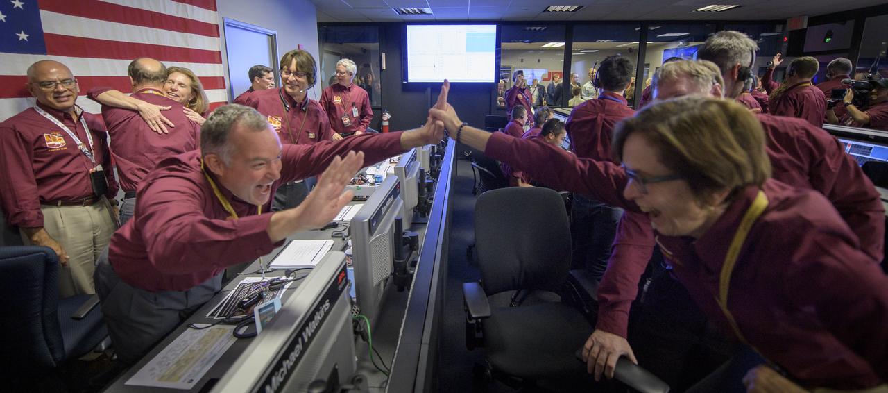 Tom Hoffman, InSight Project Manager, NASA JPL, left, and Sue Smrekar, InSight deputy principal investigator, NASA JPL, react after receiving confirmation that the Mars InSight lander successfully touched down on the surface of Mars, Monday, Nov. 26, 2018 inside the Mission Support Area at NASA's Jet Propulsion Laboratory in Pasadena, California.  InSight, short for Interior Exploration using Seismic Investigations, Geodesy and Heat Transport, is a Mars lander designed to study the "inner space" of Mars: its crust, mantle, and core. Photo Credit: (NASA/Bill Ingalls)