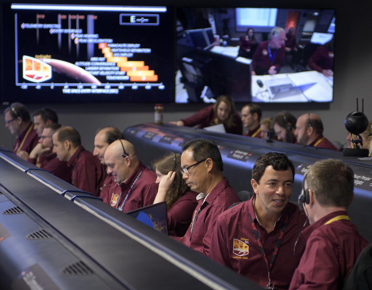 Mars InSight team members monitor the status of the lander prior to it touching down on Mars, Monday, Nov. 26, 2018 inside the Mission Support Area at NASA's Jet Propulsion Laboratory in Pasadena, California.  InSight, short for Interior Exploration using Seismic Investigations, Geodesy and Heat Transport, is a Mars lander designed to study the "inner space" of Mars: its crust, mantle, and core. Photo Credit: (NASA/Bill Ingalls)