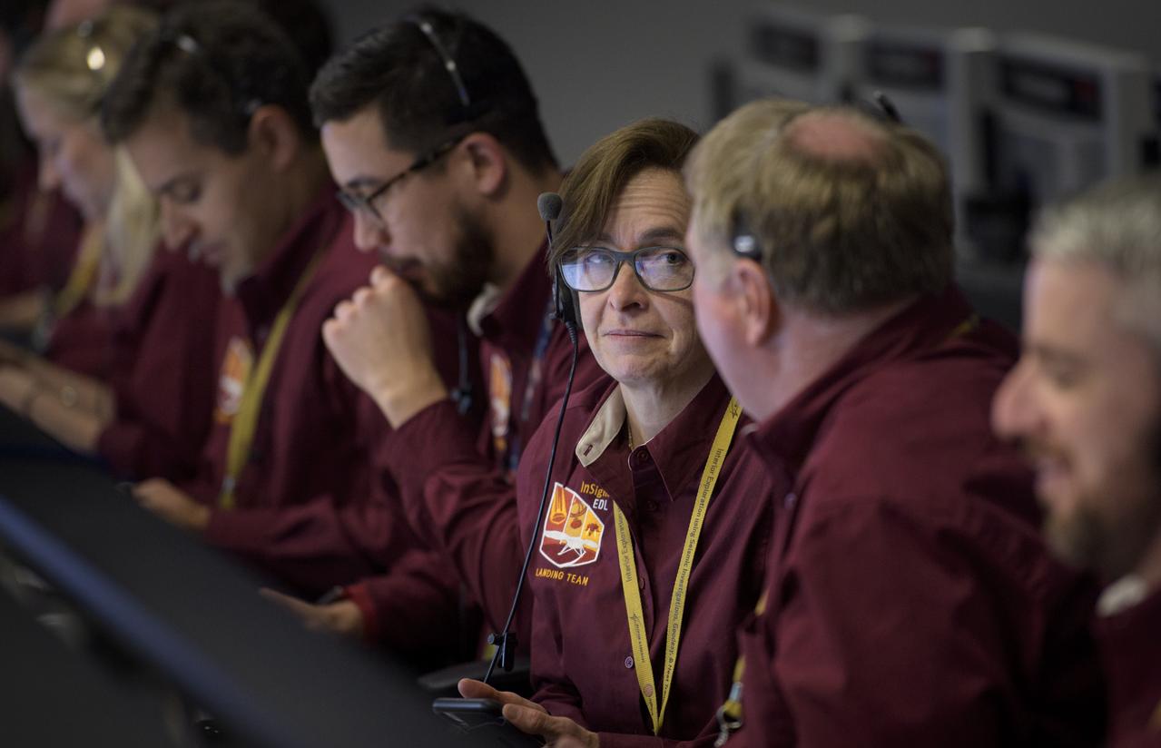 Sue Smrekar, InSight deputy principal investigator, NASA JPL, and other Mars InSight team members monitor the status of the lander prior to it touching down on Mars, Monday, Nov. 26, 2018 inside the Mission Support Area at NASA's Jet Propulsion Laboratory in Pasadena, California.  InSight, short for Interior Exploration using Seismic Investigations, Geodesy and Heat Transport, is a Mars lander designed to study the "inner space" of Mars: its crust, mantle, and core. Photo Credit: (NASA/Bill Ingalls)
