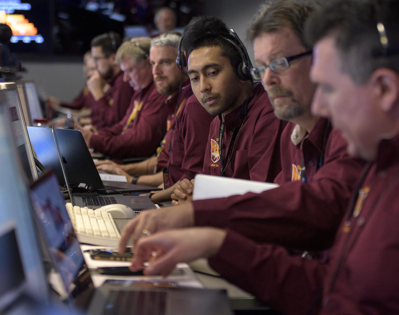Mars InSight team members monitor the status of the lander prior to it touching down on Mars, Monday, Nov. 26, 2018 inside the Mission Support Area at NASA's Jet Propulsion Laboratory in Pasadena, California.  InSight, short for Interior Exploration using Seismic Investigations, Geodesy and Heat Transport, is a Mars lander designed to study the "inner space" of Mars: its crust, mantle, and core. Photo Credit: (NASA/Bill Ingalls)