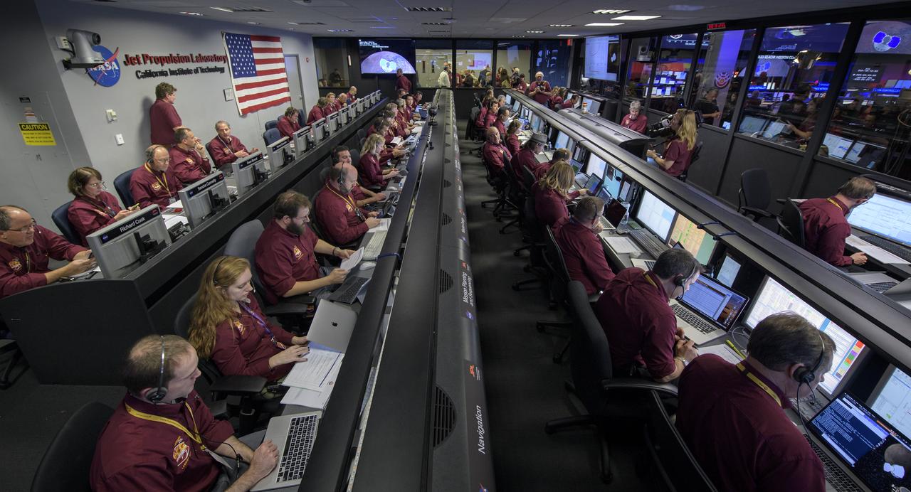 Mars InSight team members monitor the status of the lander prior to it touching down on Mars, Monday, Nov. 26, 2018 inside the Mission Support Area at NASA's Jet Propulsion Laboratory in Pasadena, California.  InSight, short for Interior Exploration using Seismic Investigations, Geodesy and Heat Transport, is a Mars lander designed to study the "inner space" of Mars: its crust, mantle, and core. Photo Credit: (NASA/Bill Ingalls)