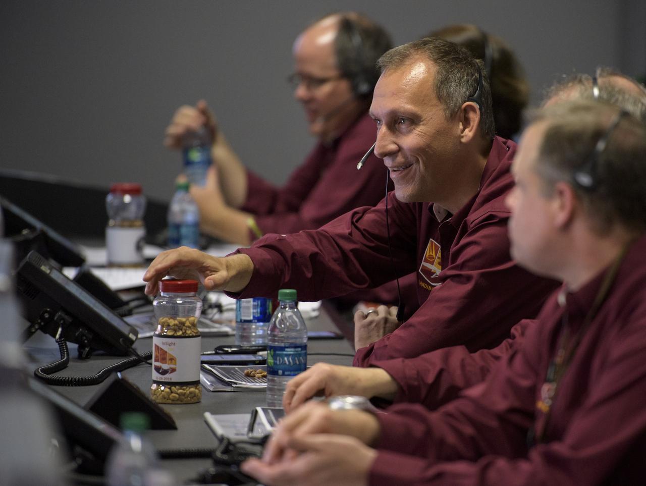 Thomas Zurbuchen, Associate Administrator of NASA’s Science Mission Directorate, NASA Headquarters and other Mars InSight team members monitor the status of the lander prior to it touching down on Mars, Monday, Nov. 26, 2018 inside the Mission Support Area at NASA's Jet Propulsion Laboratory in Pasadena, California.  InSight, short for Interior Exploration using Seismic Investigations, Geodesy and Heat Transport, is a Mars lander designed to study the "inner space" of Mars: its crust, mantle, and core. Photo Credit: (NASA/Bill Ingalls)