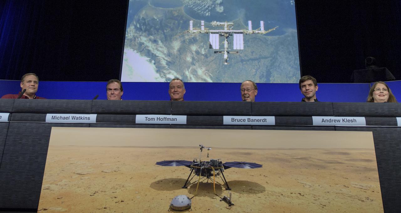 NASA Administrator Jim Bridenstine, left, JPL Director Michael Watkins, InSight Project Manager Tom Hoffman, InSight Principal Investigator Bruce Banerdt, MarCO chief engineer Andy Klesh, and InSight Instrument Operations Lead Elizabeth Barrett, listen to comments given by the International Space Station crew during a Mars InSight post-landing press conference, Monday, Nov. 26, 2018 at NASA's Jet Propulsion Laboratory in Pasadena, California. InSight, short for Interior Exploration using Seismic Investigations, Geodesy and Heat Transport, is a Mars lander designed to study the "inner space" of Mars: its crust, mantle, and core. Photo Credit: (NASA/Bill Ingalls)